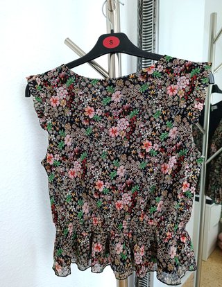 Top marca Morgan. Nuevo. Color negro con estampado