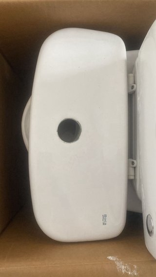 Inodoro WC con cisterna Roca