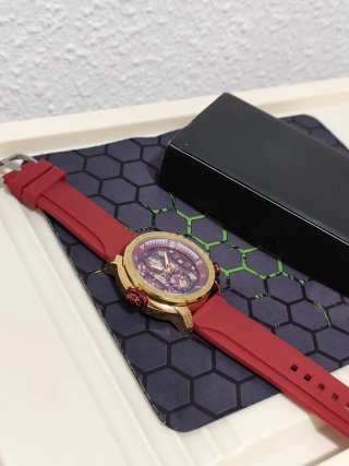 Reloj de Hombre Dorado y Rojo