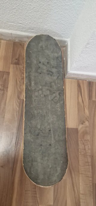 Skate Oxelo con diseño de oso