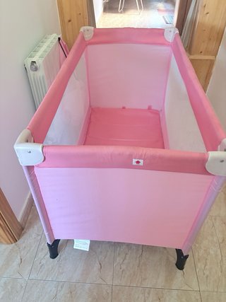 Cuna de viaje rosa