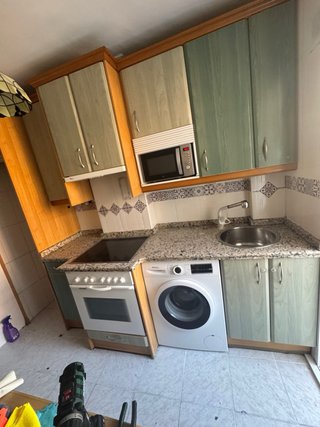 Muebles de cocina madera marrón y azul