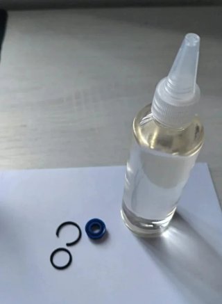 Sello pistón capota 206 + aceite hidráulico