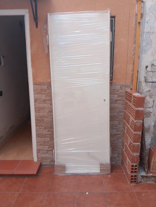 Pack de tres puertas de interior blanca.