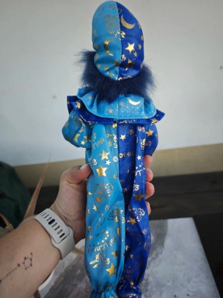 Muñeca de porcelana payaso con paraguas
