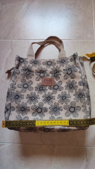 Bolso de mano floral gris y beige