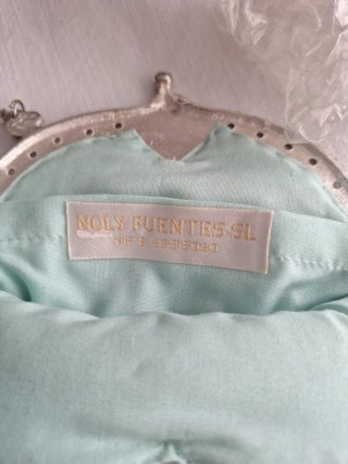 Bolso de fiesta plateado y verde azulado