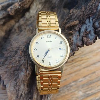 Reloj Pulsar Dorado Cuarzo