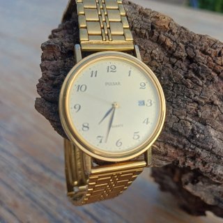 Reloj Pulsar Dorado Cuarzo