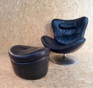 Sillón Natuzzi de piel con reposapiés