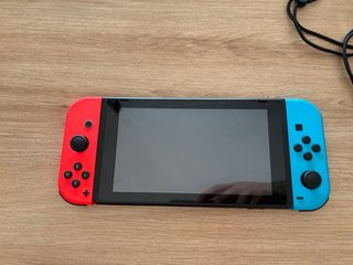 Nintendo Switch Roja y Azul + Juegos