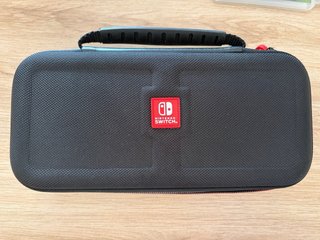 Nintendo Switch Roja y Azul + Juegos
