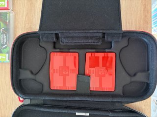 Nintendo Switch Roja y Azul + Juegos