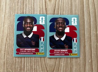 Cromos Mundial 2026 Upamecano y Konaté