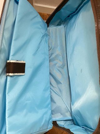 Maletín de viaje Slazenger marrón.