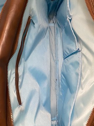 Maletín de viaje Slazenger marrón.