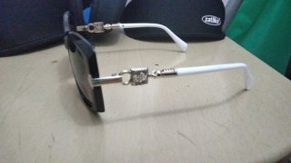+34 623 61 36 32 Gafas de marca marrones y azules