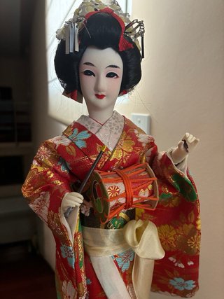 Muñeca antigua japonesa con tambor