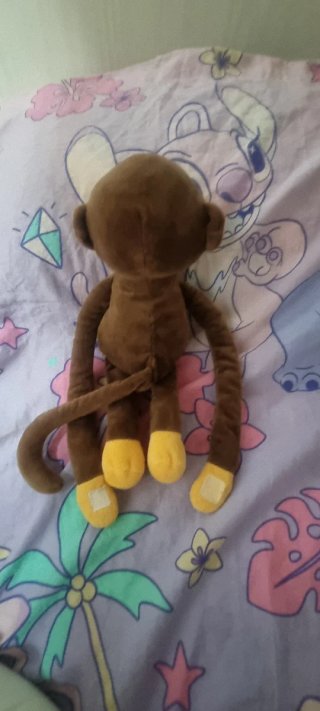 Peluche scimmia marrone e gialla