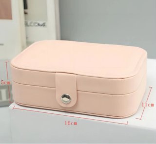 Pequeño joyero rosa cuero sintético