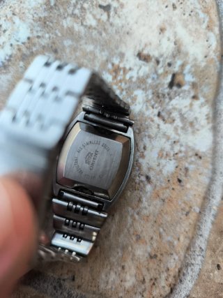Reloj Orient Pulsera Plata y Blanco