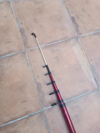 Caña de pescar con carrete
