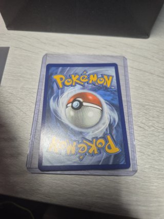 Carta pokemon Entrenador Giovanni del Team Rocket