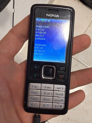 Nokia 6300 + caricabatterie