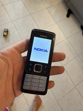 Nokia 6300 + caricabatterie