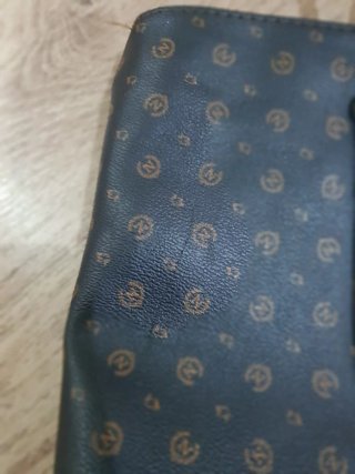 Bolso de mano italiano de cuero