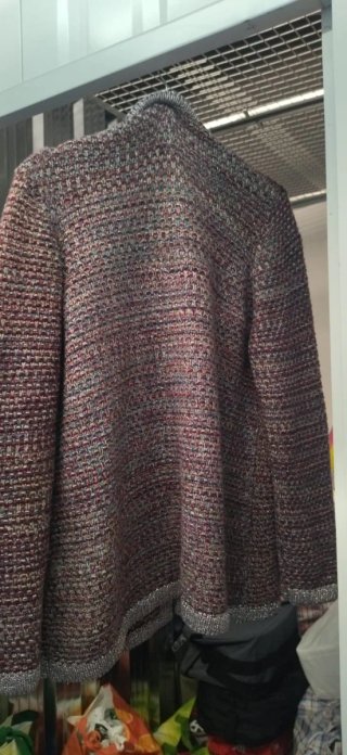 Chaqueta tejida con hilo plateado