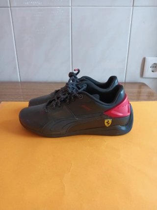 Zapatillas Puma niño negras y rojas