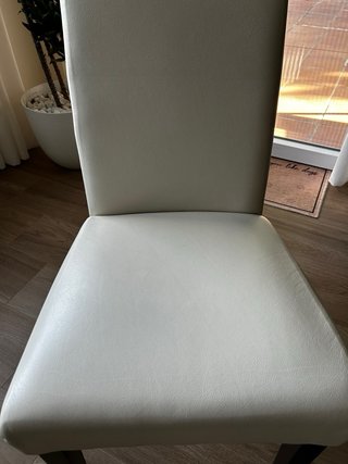 Mesa cristal y 6 sillas cuero blanco