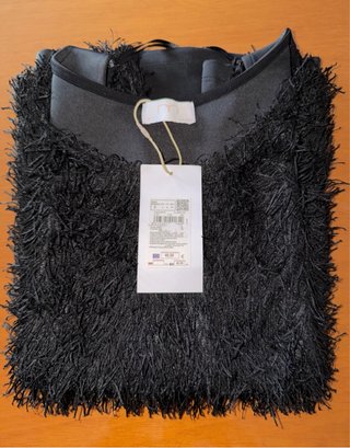 Blusa con flecos para fiesta