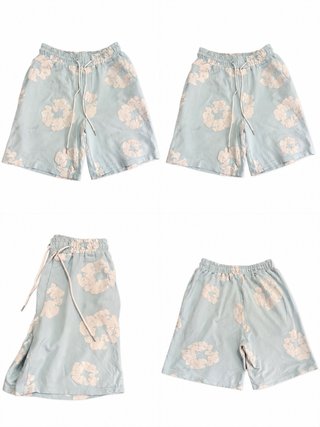 Pantalones Denim Tears azules y blancos