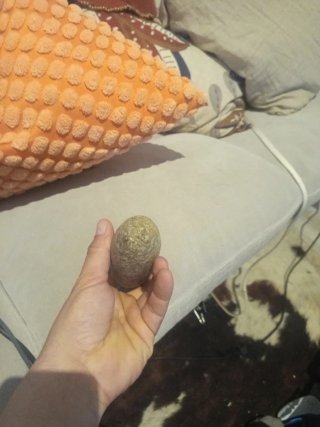Hacha de piedra antigua