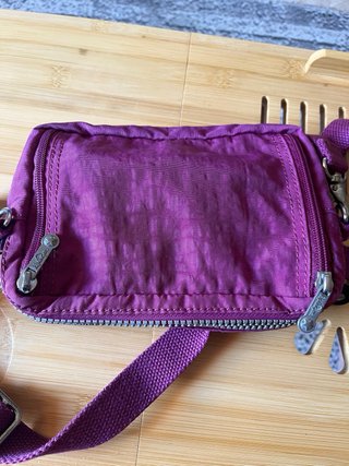 Bolso bandolera/riñonera Kipling morado