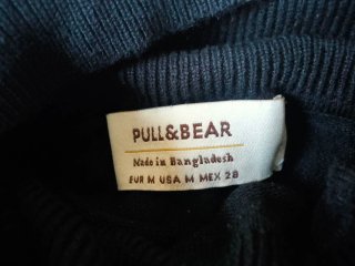 Jersey negro de cuello alto de Pull & Bear.