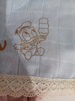Conjunto babero y toalla bebé azul