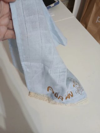 Conjunto babero y toalla bebé azul