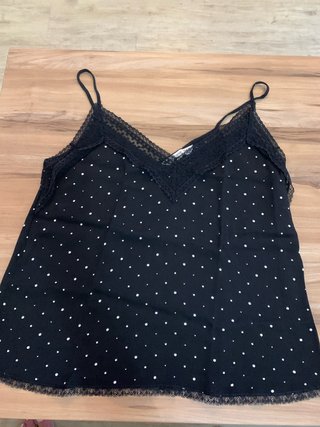 Top lencero negro con lunares blancos