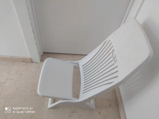 Silla de playa plegable blanca, leer anuncio