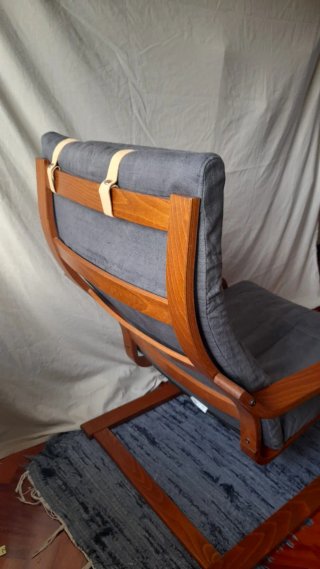 Butaca de madera y tela gris