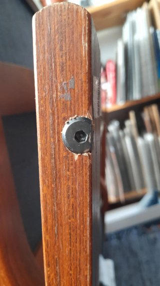 Butaca de madera y tela gris