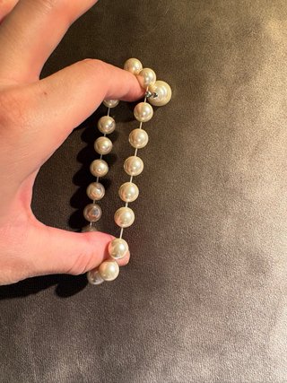 Pulsera de perlas con colgante