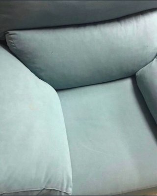 Sillón azul muy amplio y cómodo