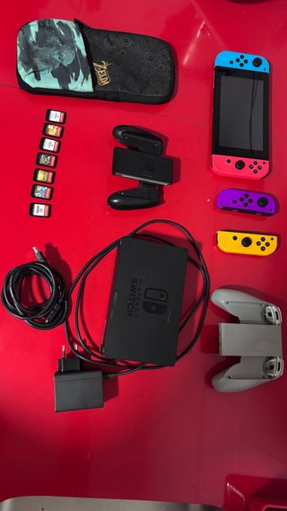Nintendo Switch + 8 juegos y accesorios