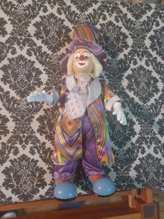 Payaso porcelana cara manos pies