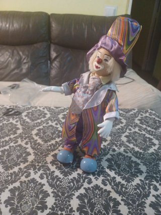 Payaso porcelana cara manos pies
