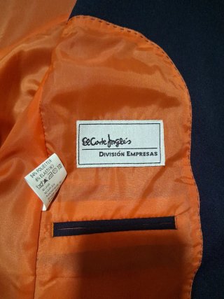 Chaqueta azul marino con forro naranja